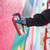 A lifestyle image of Montana GOLD Spray Paint in use for a mural.