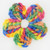 An image of a flower made with Needle Crafters Multi-Dyed Acrylic Yarn, Boho Chic.