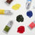 A lifestyle image of Winsor & Newton Winton Oil Color tubes.